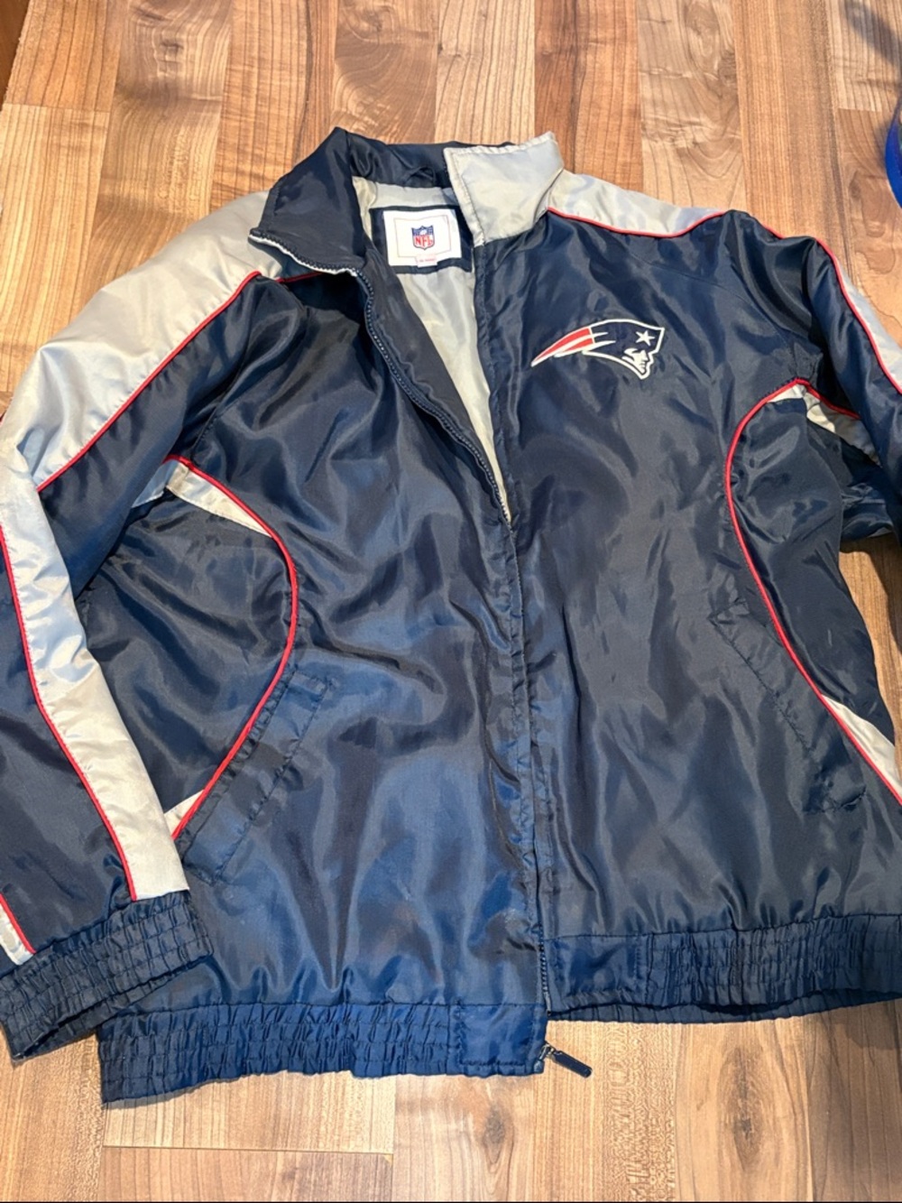NFL Patriots jacket size L, minor flaws